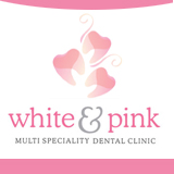 WHITE AND PINK MULTISPECIALITY DENTAL CLINIC